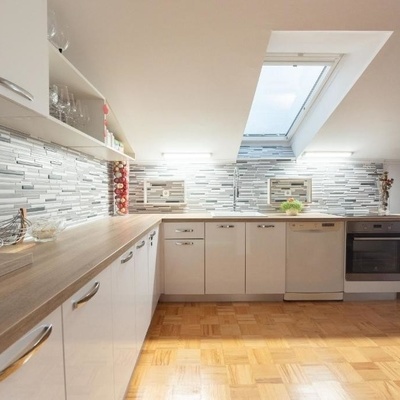 The kitchen is modern and fully equipped.