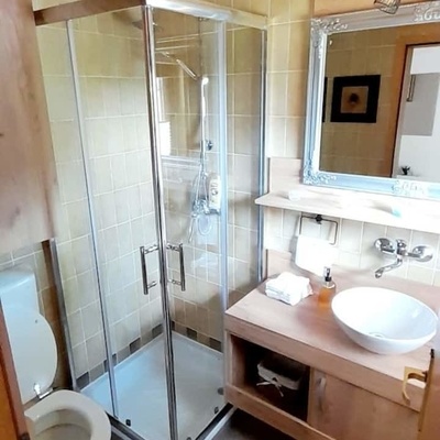 The bathroom is small but functional.