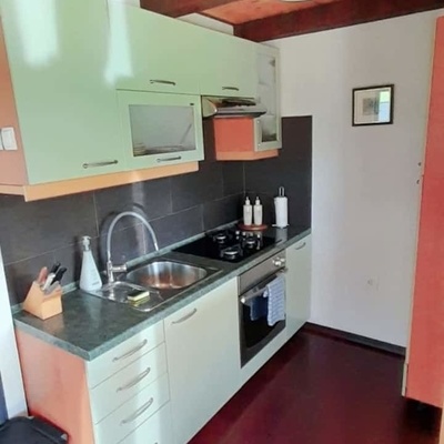 The kitchen is equipped with everything needed for meal preparation.