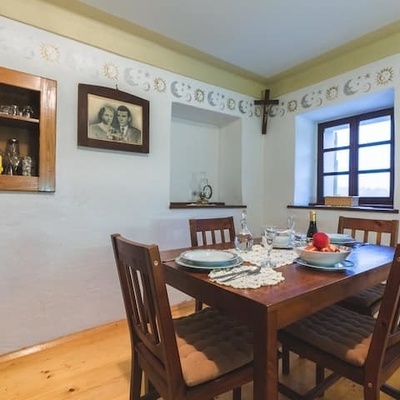 The kitchen with a dining area is set in a 150-year-old part of the house.