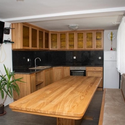 The kitchen in the luxury apartment is modern with a touch of traditional design.