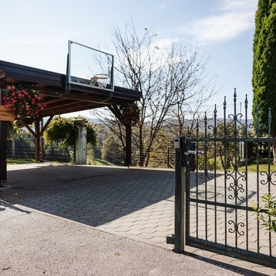 Guests can park under a covered carport.