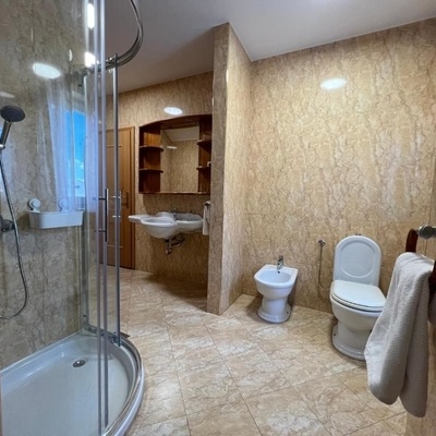 The bathroom is spacious and bright.