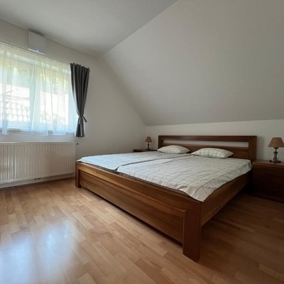Bright and nicely furnished bedroom.