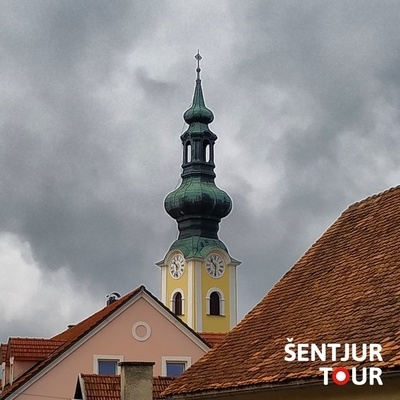 The trail takes us through the old town center of Šentjur, past the Church of St. George.