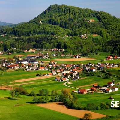 Rifnik Hill is recognizable by its shape and by the ruins of the medieval castle.