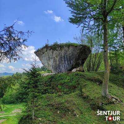 It is an upside-down rock, estimated to weigh over one hundred tons, and shaped like a pyramid.
