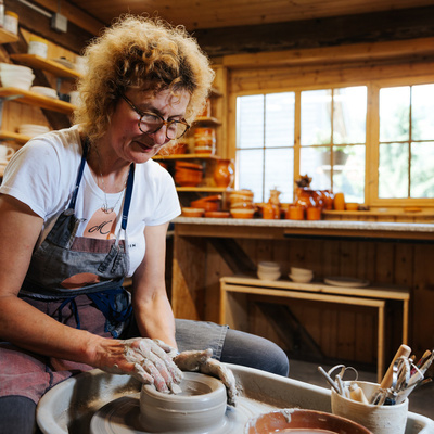 Working with clay is calming and soothing. Her pottery workshops are designed for both children and adults.