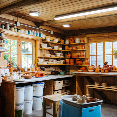 The offer includes traditional and contemporary Slovenian pottery products.